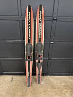 Front view showing top design, branding and foot bindings on the skis