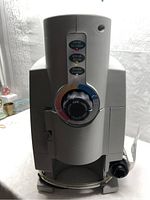 Front view of the propane tent heater showing control dial with indicators for temperature and safety.