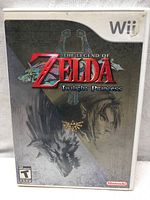 Front cover of The Legend of Zelda: Twilight Princess for Wii showing game title and characters.