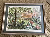 Full view of framed watercolor painting showing tree, plants, flowers, stone border, brick path, and pots on steps.
