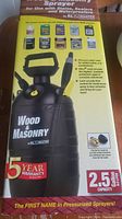 Photo of packaging showing RL Flomaster Wood & Masonry Sprayer 2.5 gallon with 5 year warranty and usage instructions