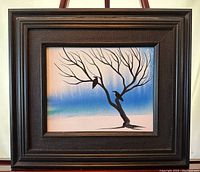 Framed oil on canvas painting of a black tree with two black birds perched on branches, gradient blue and white background.