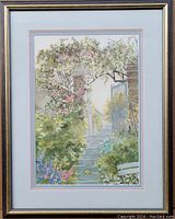 Framed vintage watercolour painting with garden gate, stone steps, flowers and greenery.