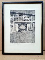 Framed etching titled 'Fireplace Great Hall Hart House' depicting a detailed fireplace with heraldic shields above.
