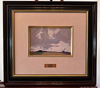 Framed textured lithograph showing the full frame and mat, centered artwork with plaque beneath.