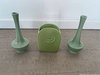 Three Trenton Potteries ceramic pieces shown side by side: two vases and one planter