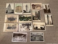 Photo showing 14 vintage US postcards featuring architectural landmarks, historical buildings and scenes