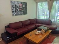 Front view of sectional sofa showing three seating modules and chaise