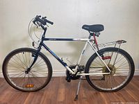 Side view of bike showing frame, wheels, seat, and handlebars