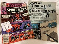Front view of Spider-Man comic book cover showing the title, artwork, and included Star Wars transfer kit promotional insert