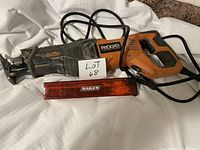 Photo of Ridgid power saw with Diablo accessory, showing the whole unit with power cord and handle.