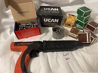 Overview of Ramset tool, pin boxes, cartridge boxes and tin of loose loads