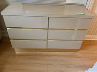 Front view of full six-drawer dresser