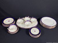 Entire dish lot arranged showing all item types and quantities