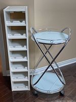 Wooden wine rack and metal framed bar cart side by side, showing overall design and condition.