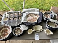 Full set of vintage English china items including plates, saucers, gravy boat, bowls, and larger serving platters with ship motifs.