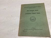 Photo of the front cover of the book showing the title, publisher, and emblem.