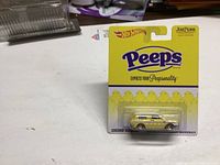 Photo of unopened Hot Wheels Peeps Volkswagen Squareback die-cast car in original packaging with Peeps branded backing card