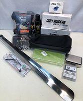 Full overview of all men’s items including grooming products, eyewear, accessories, and packaging.