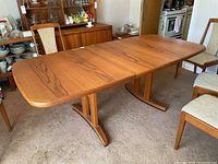 Front three-quarter view of table with one leaf attached