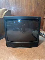 Front view of Zenith 27-inch tube television showing curved CRT screen, black casing with speaker grille at bottom, model A25A11D label on top right corner.