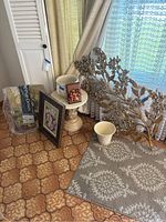 All items in lot shown: table, plant pots, metal wall art, framed print, mattress pad packaging