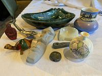 Wide view of all items arranged on a white cloth