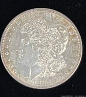 Obverse view of the 1886-P Morgan Silver Dollar showing Lady Liberty profile and date 1886