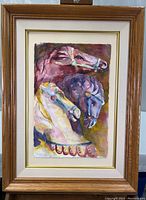 Framed watercolor painting showing full mounting and frame.