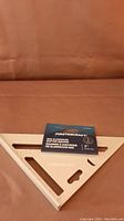 Photo of a Mastercraft aluminum rafter square 12 inches with packaging label showing brand and size.
