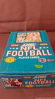 Front view of the 1990 Score NFL Football Player Cards Series 2 Wax Box showing design and condition.