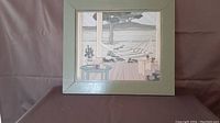 Front view of framed wooden inlay picture showing porch scene with hammock and table