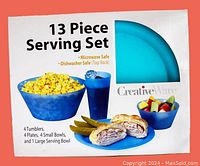 Box front showing image of 13-piece serving set with tumblers, plates, small bowls, and large bowl. States microwave and dishwasher safe (top rack).