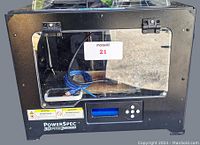 Front view of PowerSpec 3D Pro 2 printer showing LCD screen, control buttons, and clear acrylic top cover