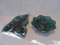 Both Blue Mountain Pottery ceramic dishes on white background, showing overall shape and glaze.