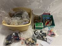 Wide view of entire lot showing bin, bags, containers with buttons and crafting supplies