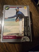 Front of sealed 1991 Baseball Draft Picks set featuring Brien Taylor card visible inside plastic case.