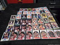 46 vintage Charles Barkley basketball cards laid out in a grid, showing multiple series and poses.