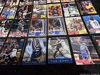 Top view of vintage Shaquille O'Neal basketball cards laid out side by side showing different card designs and rookie cards