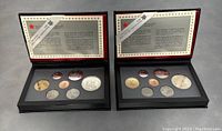 Two open black presentation cases each holding seven Canadian coins from 1989, including a larger silver dollar and smaller coins.