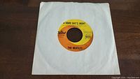 Photo showing The Beatles 45 rpm vinyl record label with the song "A Hard Day's Night," Capitol Records label number 5222.