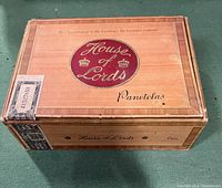 Image of closed House of Lords Panatelas wooden cigarette box with vintage logo and label