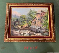 Full view of the framed oil painting showing landscape with river and mill building, approximate size 23" by 19".