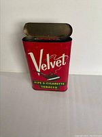 Red Velvet pipe and cigarette tobacco tin open showing inside, good condition with light scratches.