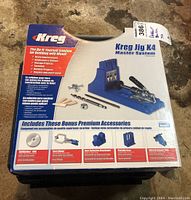 Front view of Kreg Jig K4 Master System box with premium accessories list and label showing Dewalt and price.