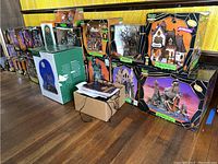 Overview of boxed Spooky Town buildings arranged on floor