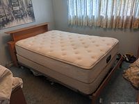 Mattress and boxspring set on a wooden frame (frame sold separately)