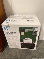 Front of sealed HP Color LaserJet Pro MFP M283fdw box showing branding and model information.