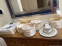 Overall view of set including storage cases, teacups, saucers and plates