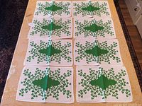 Eight Irish linen placemats arranged on a table showing full layout and design consistency